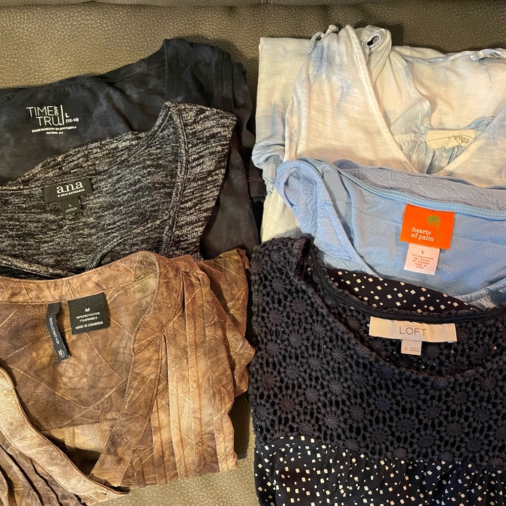 3 large tank tops 2 medium (fit like large) tank tops and 1 short sleeve shirt